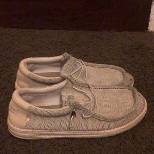 A pair of grey and white hey dudes